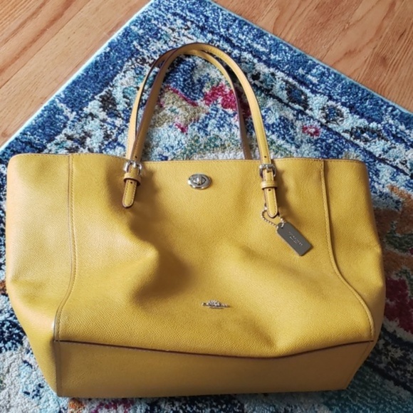 mustard yellow coach bag